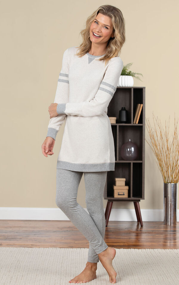 Model standing on a rug wearing Oatmeal Sweatshirt and Leggings Pajama Set for Women image number 5