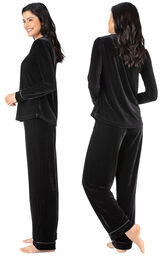 Model wearing Black Velour PJ with Satin Trim for Women, facing away from the camera and then to the side image number 1