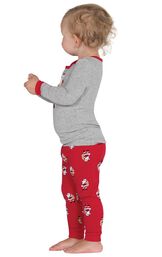 Model wearing Red and Gray St. Nick Infant Pajamas, facing to the side image number 1