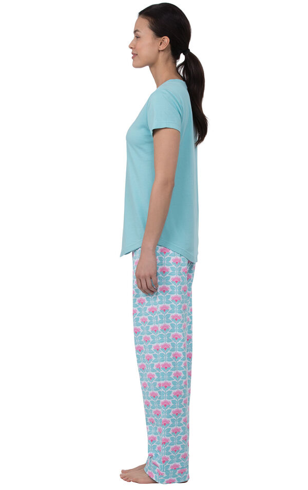Model facing to the side wearing Aqua Floral V-neck Short-Sleeve PJ for Women with Modern Floral Full-length pants image number 2