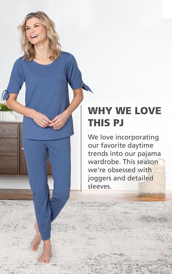 Model wearing Dusk Peekaboo Pajamas with the following copy: Why We Love This PJ: We love incorporating our favorite daytime trends into our pajama wardrobe. This season we're obsessed with joggers and detailed sleeves. image number 2
