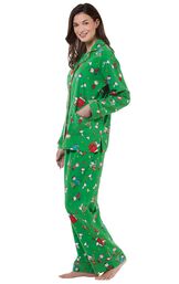 Model wearing Green with Red Trim Charlie Brown Christmas Women's Pajamas, facing to the side image number 2