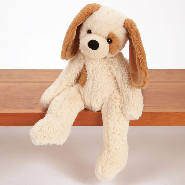 Buddy Puppy - Front view of tan Puppy with brown ears and spot sitting on a shelf image number 0