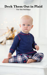 Infant sitting down wearing Snowfall Plaid Infant Pajamas with the following copy: Deck Them Out in Plaid for the Holidays. image number 1