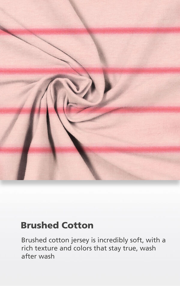 Pink Stripe Fabric with the following copy: Brushed cotton jersey is incredibly soft, with a rich texture and colors that stay true, wash after wash image number 4