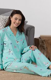 Model sitting on couch wearing Light Blue Dog Print Button-Front PJ for Women image number 3