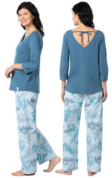 Model wearing Blue Margaritaville Tie-back PJ for Women, facing away from the camera and then to the side image number 1