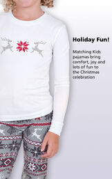 Close-up of Long-sleeve top with the following copy: Holiday fun! Matching Kids pajamas bring comfort, joy and lots of fun to the Christmas celebration image number 1
