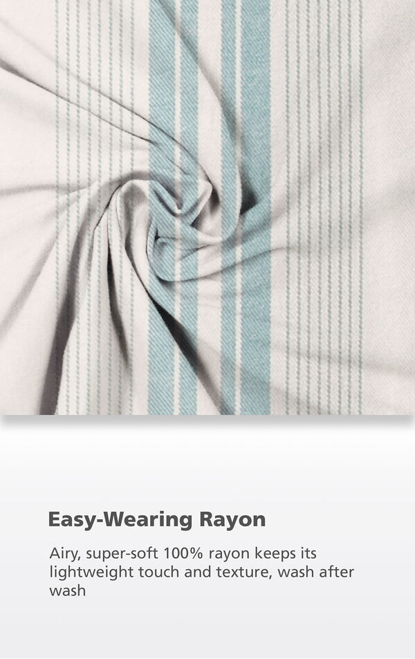 Blue and White Cabana Stripe fabric with the following copy: Airy, super-soft 100% rayon keeps its lightweight touch and texture, wash after wash image number 4
