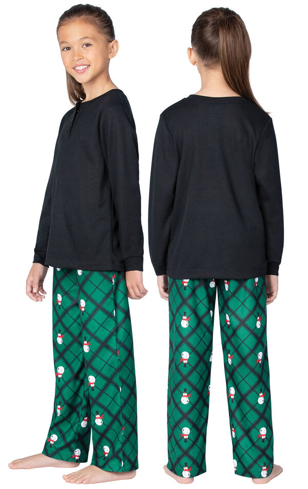 Model wearing Black and Green Snowman Argyle Henley PJ for Girls, facing away from the camera and then to the side image number 1