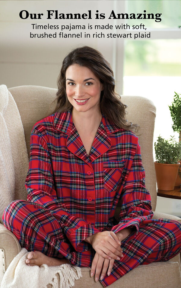 Model sitting on couch wearing Stewart Plaid Flannel Boyfriend Pajamas with the following copy: Our Flannel is Amazing. Timeless PJs are made with soft, brushed flannel in rich Stewart plaid