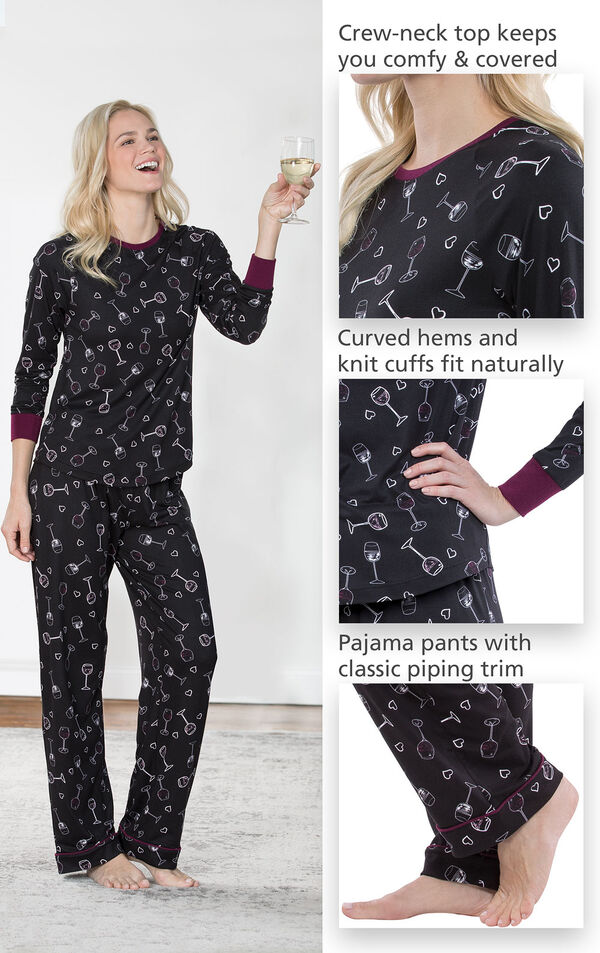Model wearing Wine Down Pajamas holding a glass of wine with close-ups of the following details: Crew-neck top keeps you comfy and covered, Curved hems and knit cuffs fit naturally, Pajama Pants with classic piping trim image number 3