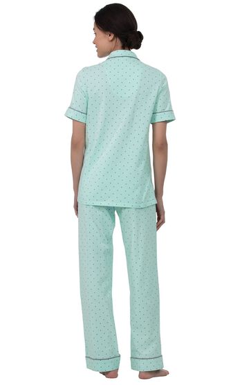 Model wearing Mint and Gray Polka Dot Short Sleeve Button-Front PJ for Women, facing away from the camera
