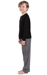 Model wearing Charcoal Gray and Black Stripe PJ for Youth, facing to the side image number 2