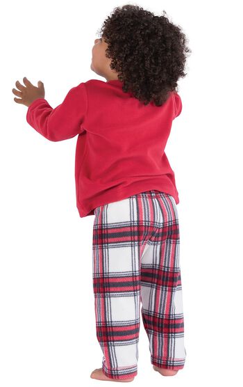 Model wearing Red and White Plaid Fleece PJ for Infants, facing away from the camera