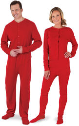 Models wearing Red Dropseat Onesie PJ for Him and Her image number 0