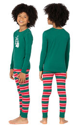 Model wearing Red and Green Christmas Stripe PJ for Kids, facing away from the camera and then to the side image number 1