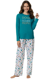 Model wearing Teal and White Pajamas with "Dogs are My favorite people" text on Top and Dog print on pants