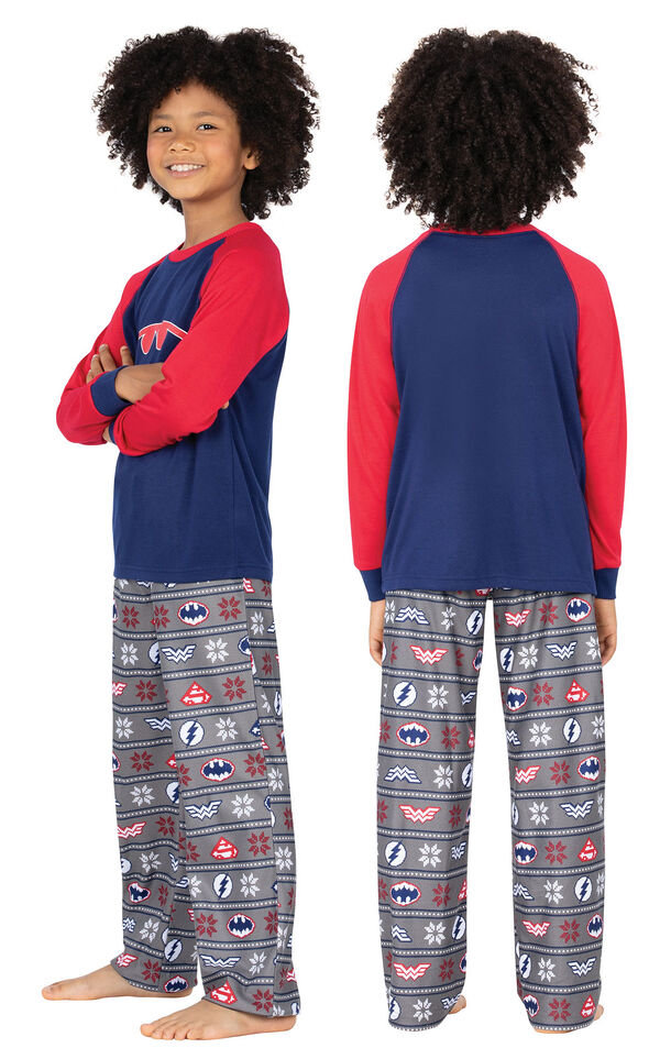 Model wearing Red and Blue Justice League PJ for Kids, facing away from the camera and then to the side image number 1