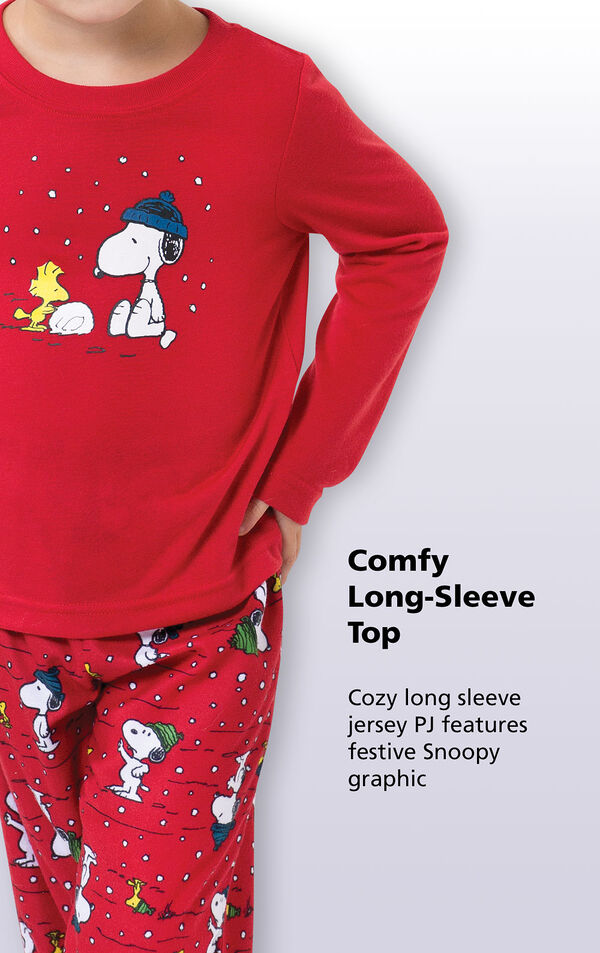 Close-up of comfy red long-sleeve top with the following copy: Cozy long sleeve jersey PJ features festive Snoopy graphic. image number 2