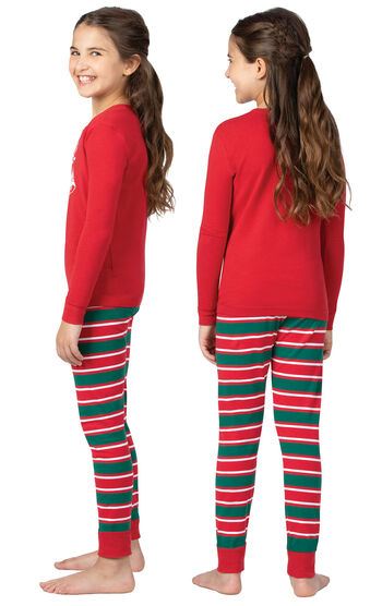 Model wearing Red and Green Christmas Stripe PJ - Kids, facing away from the camera and then to the side