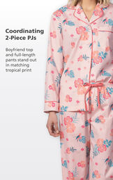 Close-up of Margaritaville Hibiscus Boyfriend Pajamas - Pink coordinating 2-Piece PJs. Boyfriend top and full-length pants stand out in matching tropical print. image number 4