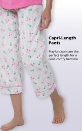 Close-up of Flamingo Stripe PJs Capri-Length Pants with the following copy: Playful capris are the perfect length for a cool, comfy bedtime image number 4