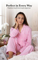 Model wearing Pink Pin Dot Button-Front PJ for Women sitting on bed image number 3