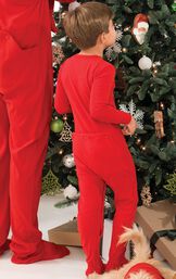 Toddler Boy wearing Red Dropseat PJs, decorating the Christmas tree image number 2