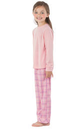 Model wearing Pink Plaid PJ for Youth, facing away from the camera and then facing towards the side image number 1