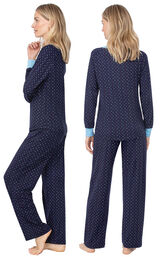 Model wearing Whisper Knit Henley Pajamas - Navy with Dots, facing away from the camera and then to the side image number 1