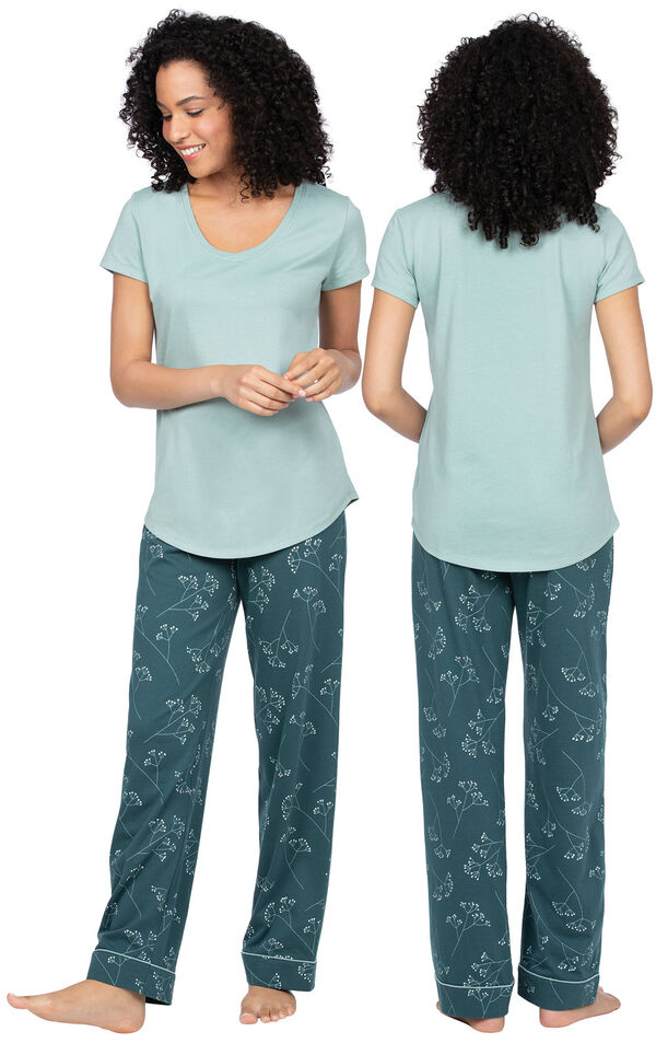 Model wearing Dark Green Floral Print PJ for Women, facing away from the camera and then facing to the side image number 1