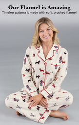 Model sitting on ground wearing Christmas Dogs Boyfriend Pajamas - Cream image number 3