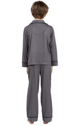 Model wearing Charcoal Gray and Black Stripe Button-Front PJ for Youth, facing away from the camera image number 1