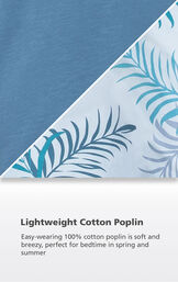 Blue Fabric with Palm Frond Print close up with the following copy: Easy-wearing 100% cotton poplin is soft and breezy, perfect for bedtime in spring and summer image number 4