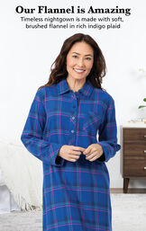 Model wearing Indigo Plaid Nighty by bed with the following copy: Our Flannel is Amazing. Timeless nightgown is made with woven, yarn dyed flannel in rich indigo plaid image number 2