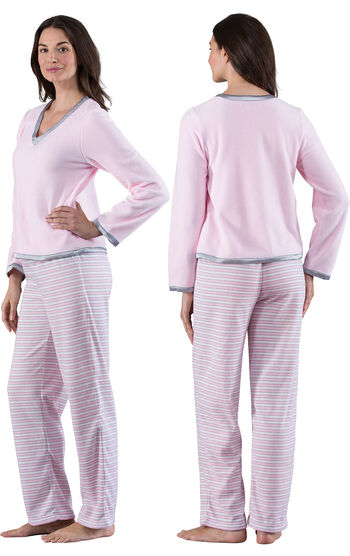 Model wearing Light Pink Stripe Fleece PJ for Women, facing away from the camera and then to the side