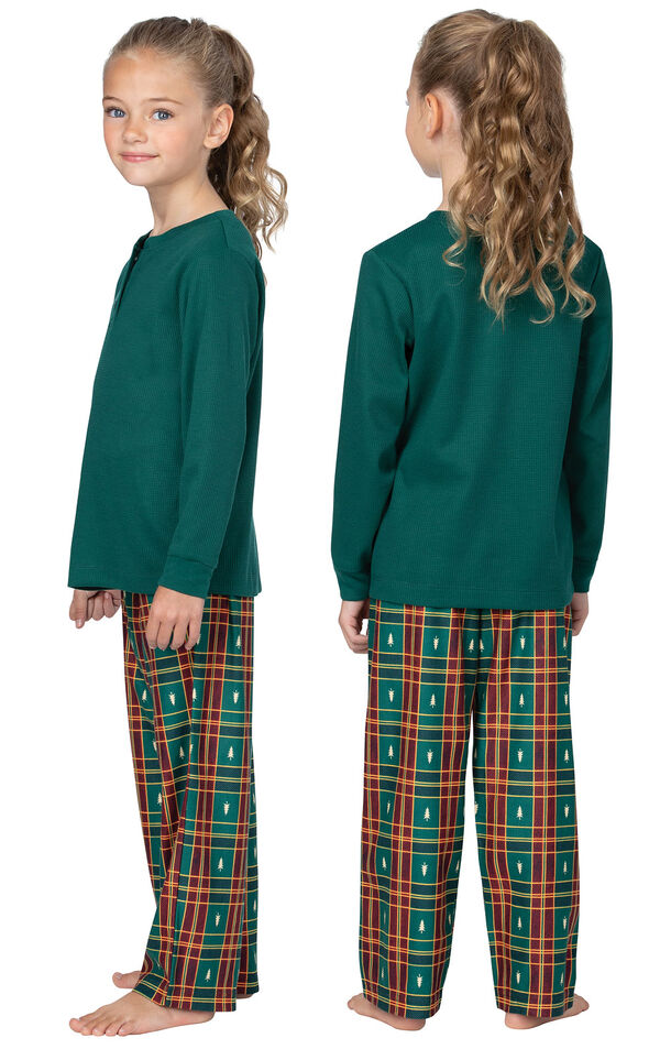 Model wearing Red and Green Christmas Tree Plaid Thermal Top PJ for Girls, facing away from the camera and then to the side image number 1