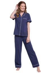 Model wearing Navy Blue and White Polka Dot Short Sleeve Button-Front PJ for Women image number 0