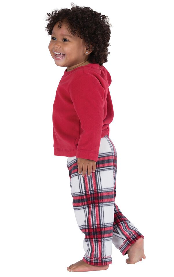 Model wearing Red and White Plaid Fleece PJ for Infants, facing to the side