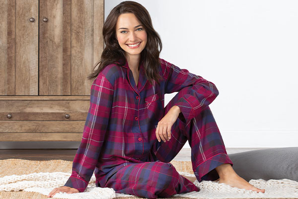 A model wearing PajamaGram World's Softest Flannel Boyfriend Pajamas