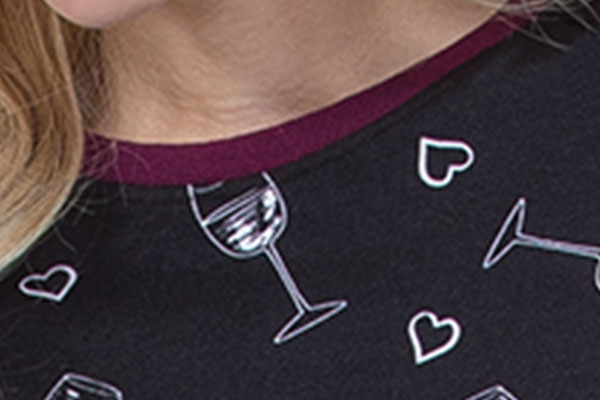 A model wearing Pajamagram Wine Down pajamas
