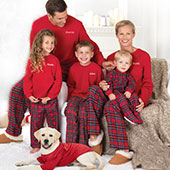 A family wearing PajamaGram Matching Family Pajamas